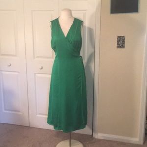 Green full wrap dress with elegant details